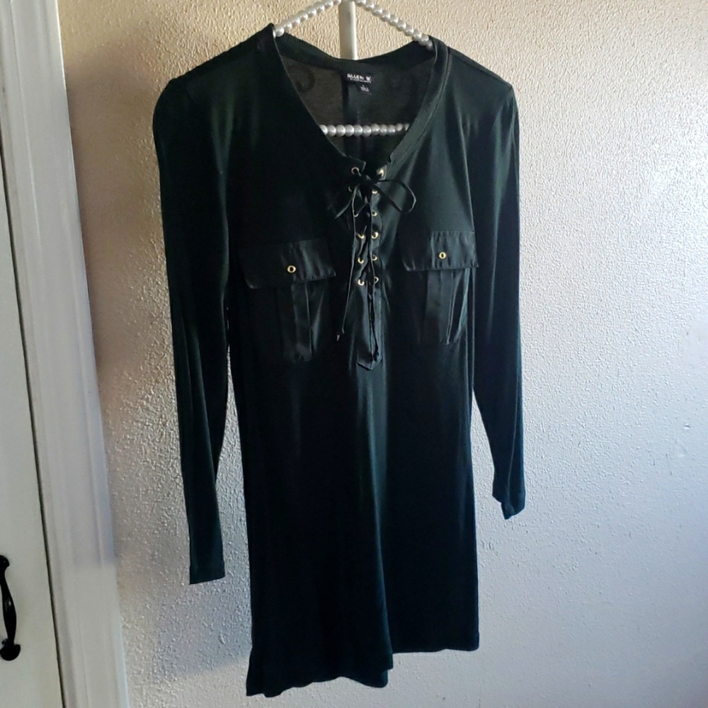 Cute forest green top with lace front.